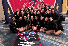 Cougarettes pose for team photo after winning national championship.