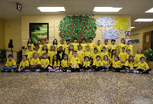 Group photo of second grade "Little Leaders" in Wood Park school's main lobby.