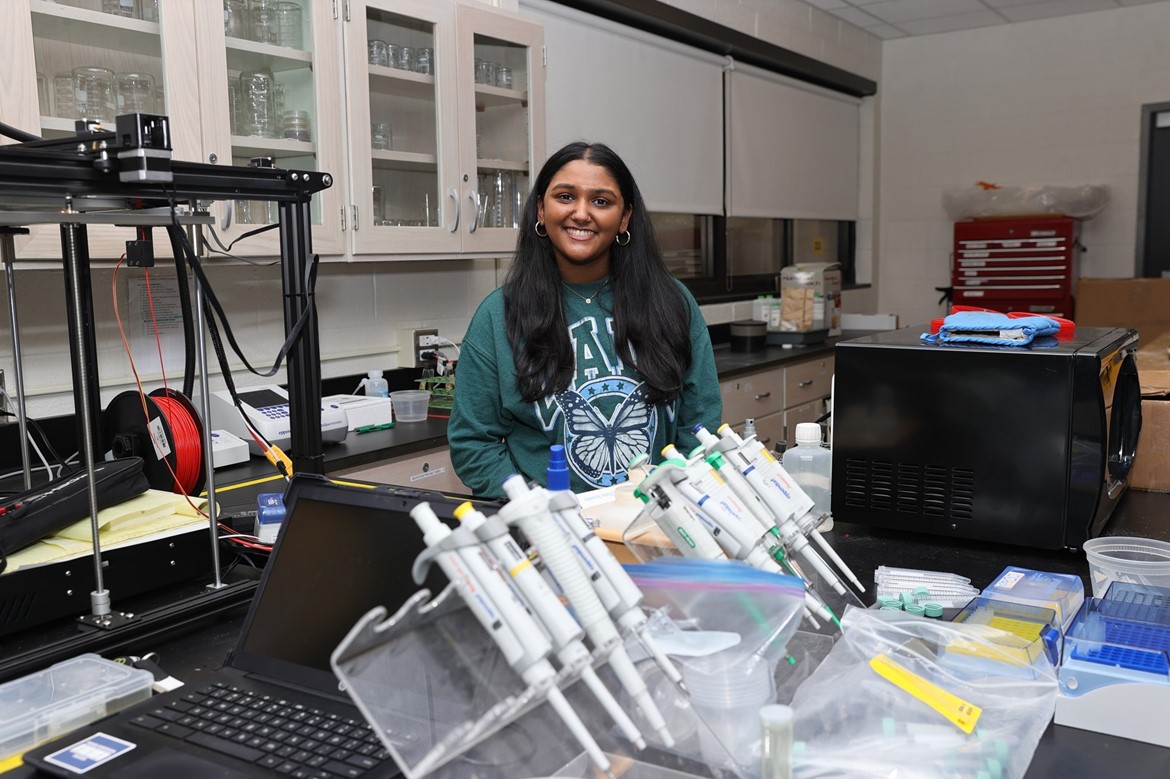 11th grader Shivani Muthukumar in science lab.