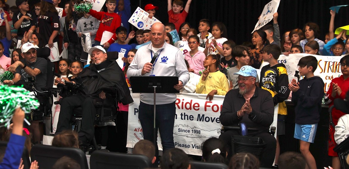 Burr principal speaks to students at ALS Ride for Life event.